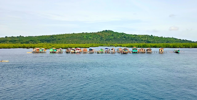 Rows of colorful stilt houses in Basilan