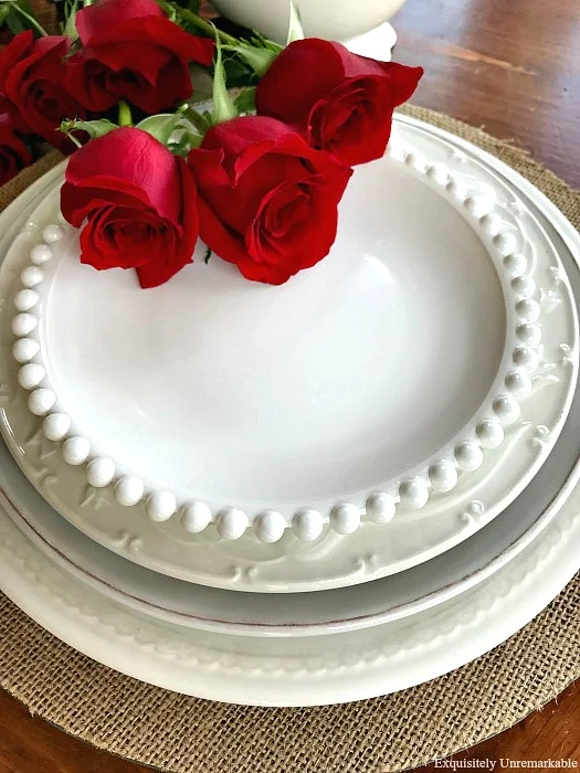 Layered White Plates and roses