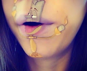 فتاة بريطانية تحول فمها لشخصيات كرتونية!