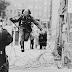 Photograph of the first official defector of the "German Democratic Republic", Conrad Schumann, who escaped to the western side on August 15, 1961 after jumping the unfinished area of the fence that he guarded.