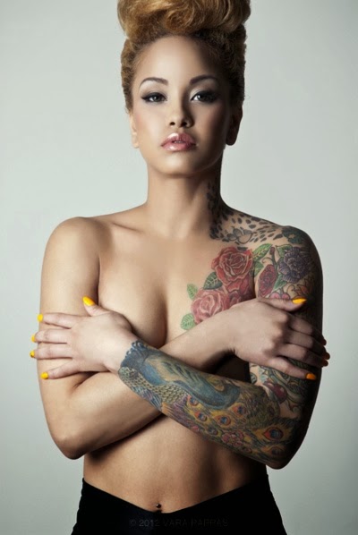 Floral Tattoos and Pigeon Tattoo Drawn on Chest and Arms of a Sexy Girl