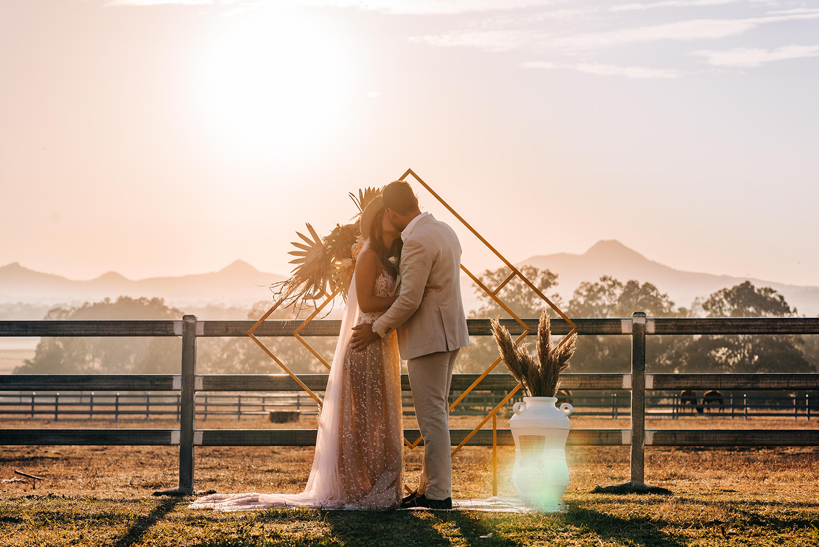 to the aisle australia | champagne at sunrise summer land camels shoot match made photography gold coast weddings country boho floral design cake stationery venue