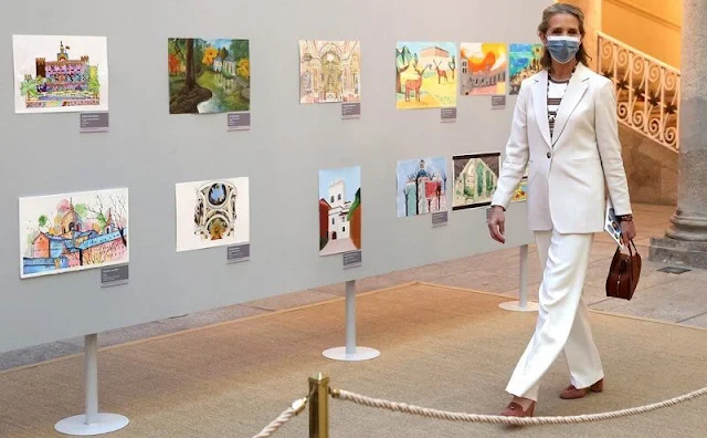 Infanta Elena attended the 30th edition of the Children and Youth Painting Contest for School Centers. The Infanta wore a cream blazer suit
