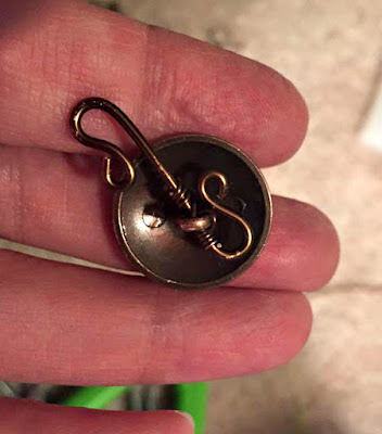 S clasp with button. S clasp with button.