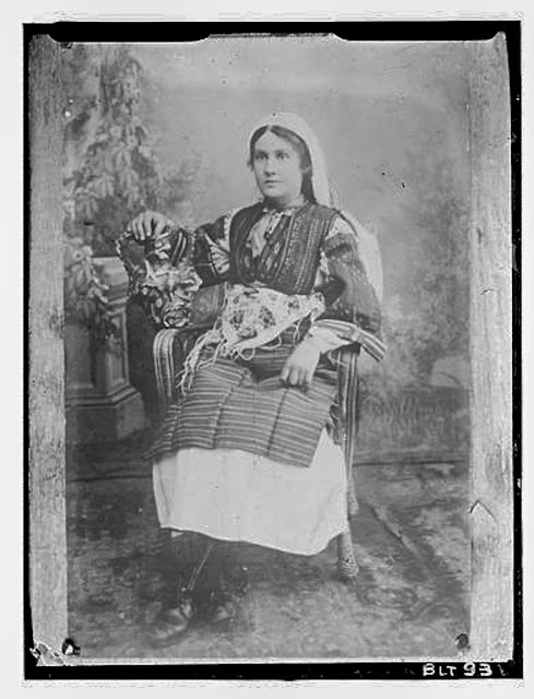 Reproduction of a photographic print of a seated Macedonian woman, village Negochani (Niki)