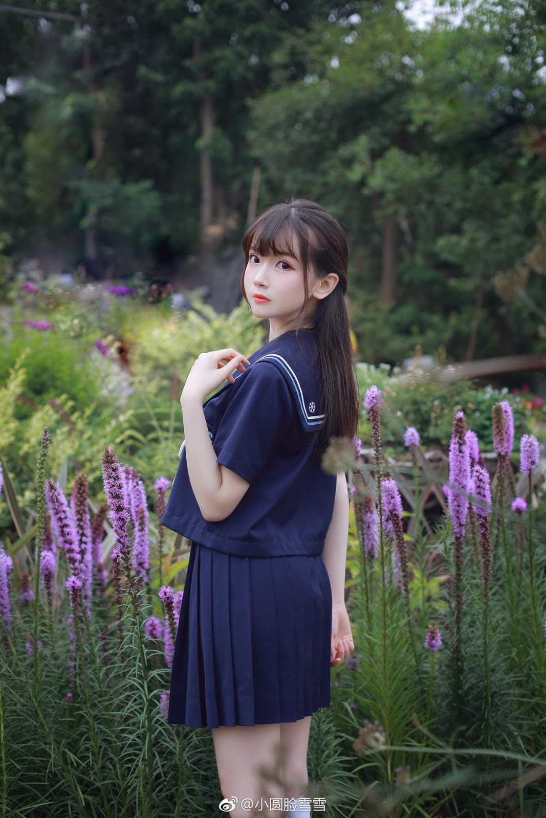Chinese cute model - Little girl in the flower garden
