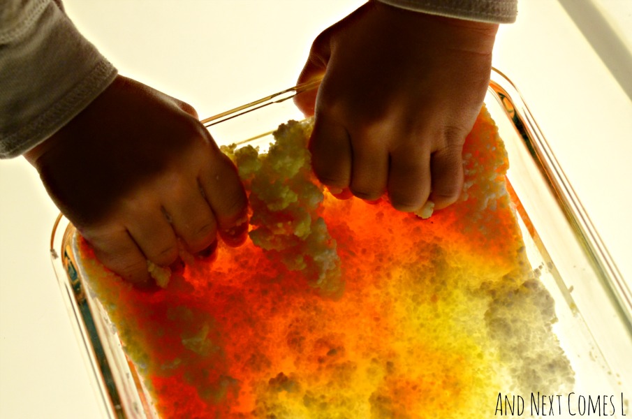 Messy Halloween sensory play on the light table for toddlers and preschoolers from And Next Comes L