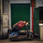 An Indian Man Sleeps on a Scooter - © JapanCameraHunter / Instagram