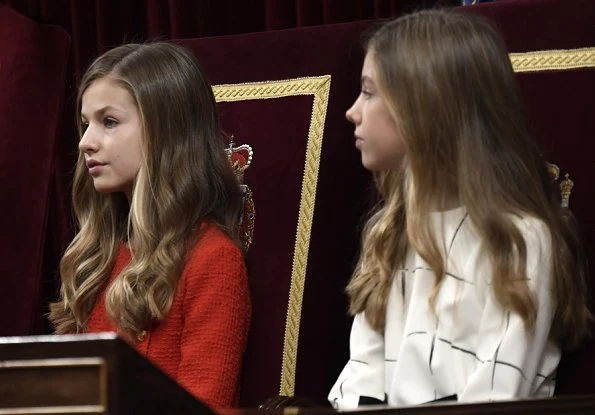 Queen Letizia, Princess Leonor and Infanta Sofía attended the Solemn opening of the Spanish Parliament. Carolina Herrera cape and dress