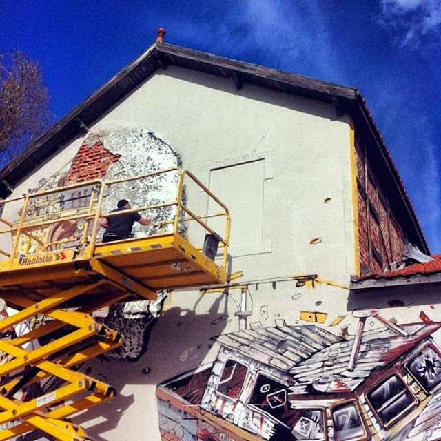 Street Art Collaboration By Vhils and Pixel Pancho On The Streets Of Lisbon, Portugal. 2