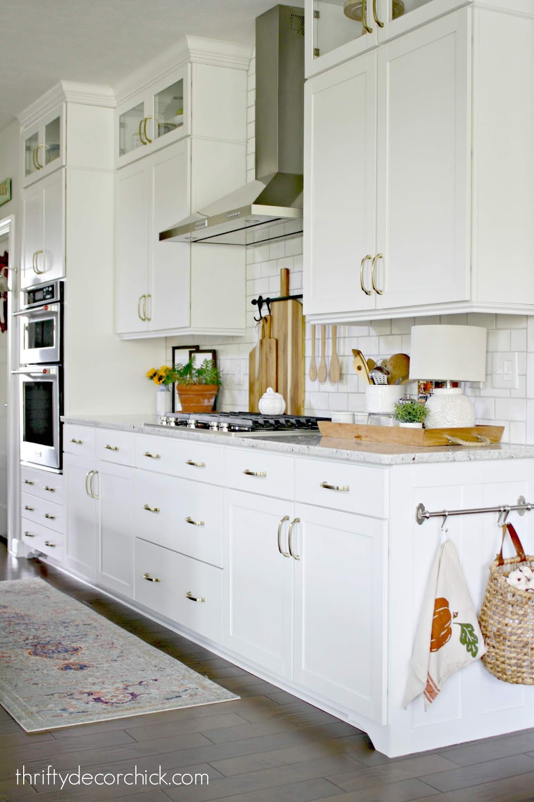 Adding small DIY details to kitchen cabinets 
