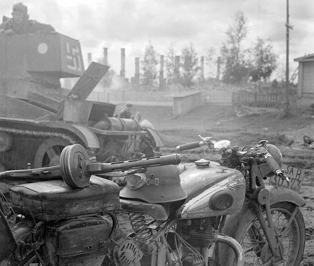 Finnish motorcycle and tank.