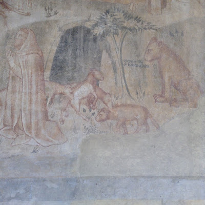 Ex Convento di Santa Marta a Siena: chiostro affreschi monocromi con scene di vita eremitica