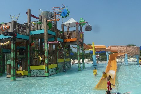 Sharky’s Lagoon water playground is an 18-inch-deep pool that includes ...