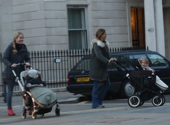 Princess Madeleine was seen in downtown of London while she was showing her children Princess Leonore and Prince Nicolas, Princess Madeleine wore coat, style
