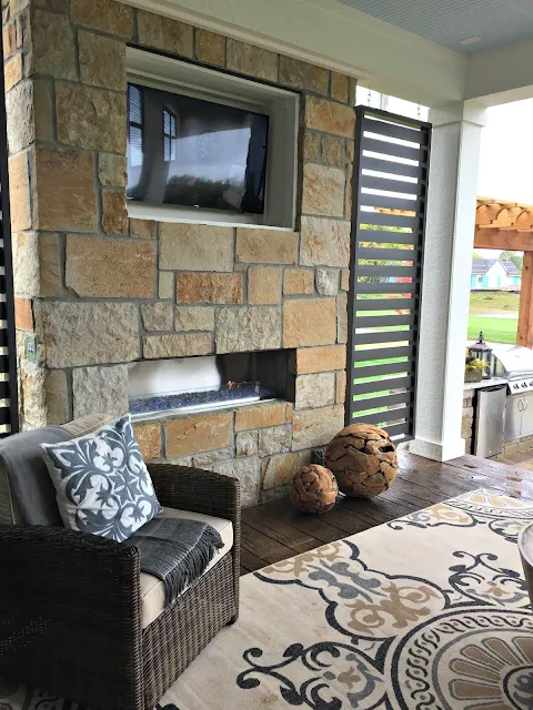outdoor fireplace and TV combo