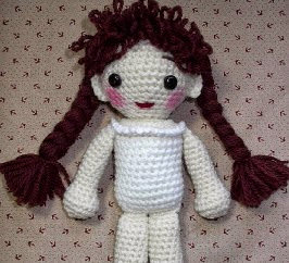 http://es.scribd.com/doc/99920769/Basic-Crochet-Doll