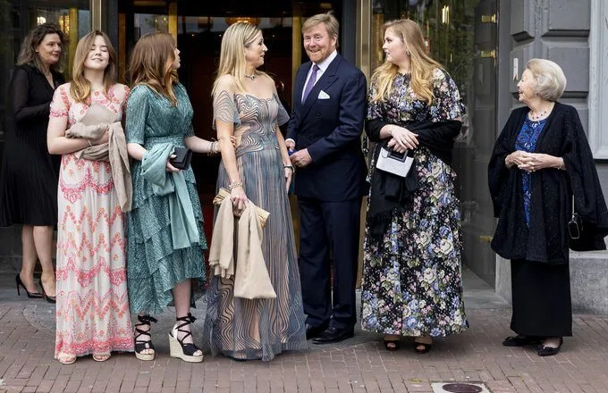 Princess Amalia and Princess Ariane in maxi dress by Needle & Thread, Princess Alexia in green dress by Maje, Maxima in blue dress by Iris van Herpen