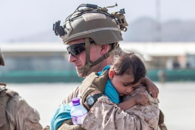 Exploitative Viral PR Photos Of Military Invaders With Afghan Kids