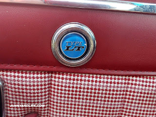 Detail of red deluxe door panel in the Type LT Camaro.