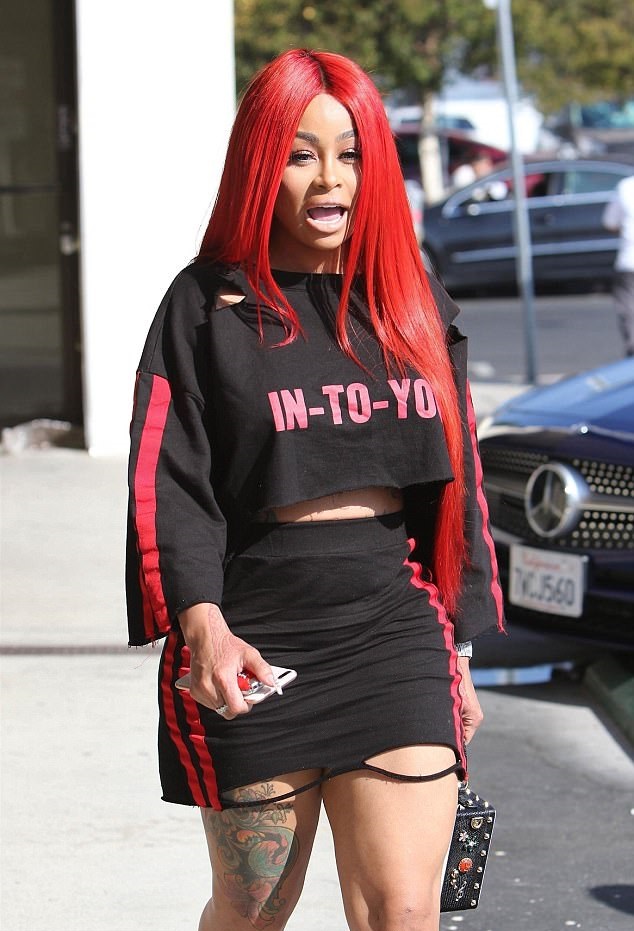Blac Chyna Looking More Fiery With Her New Blood Red Hair (See Sexy Photos)...