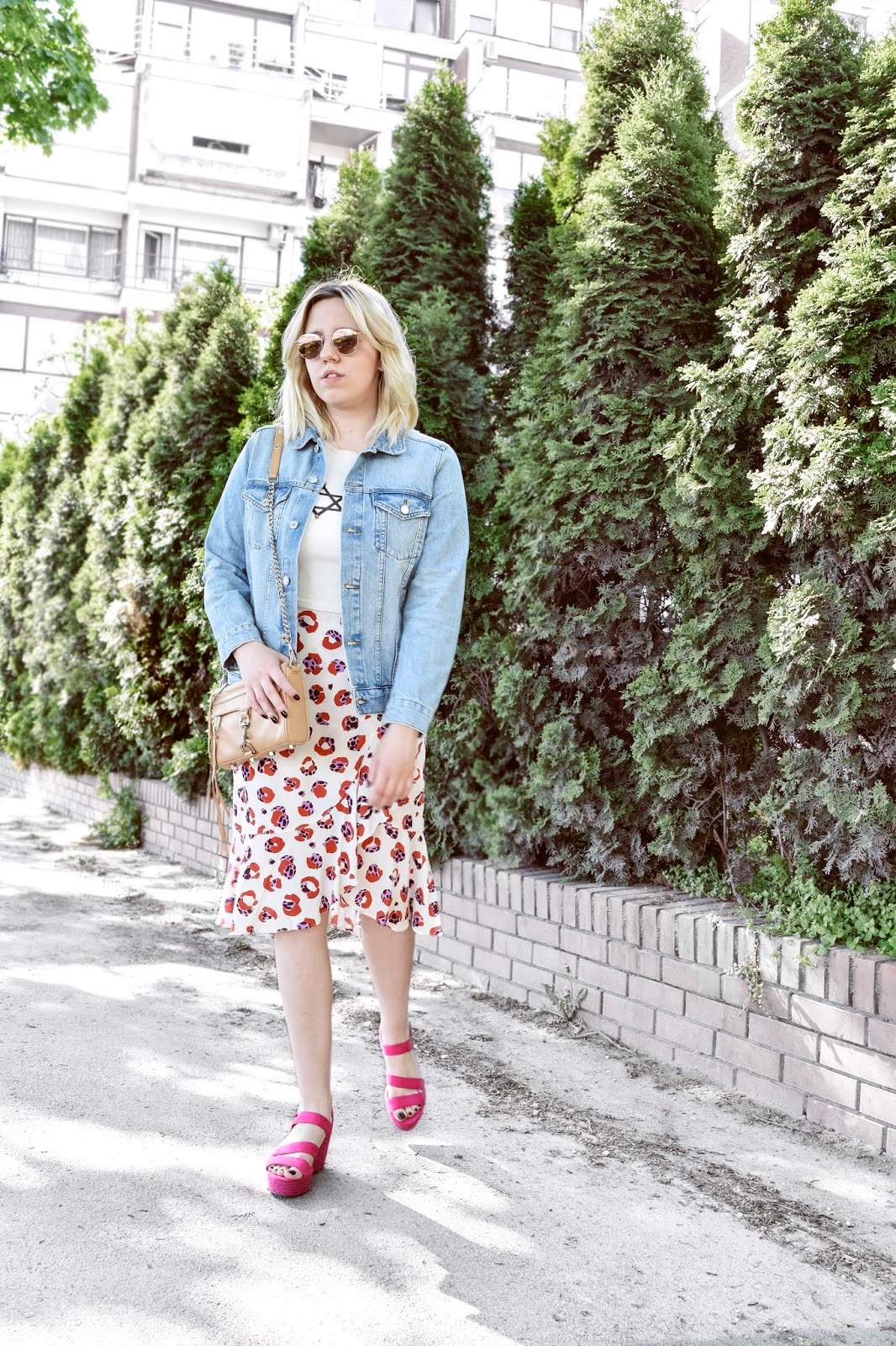 Floral midi skirt and denim jacket outfit