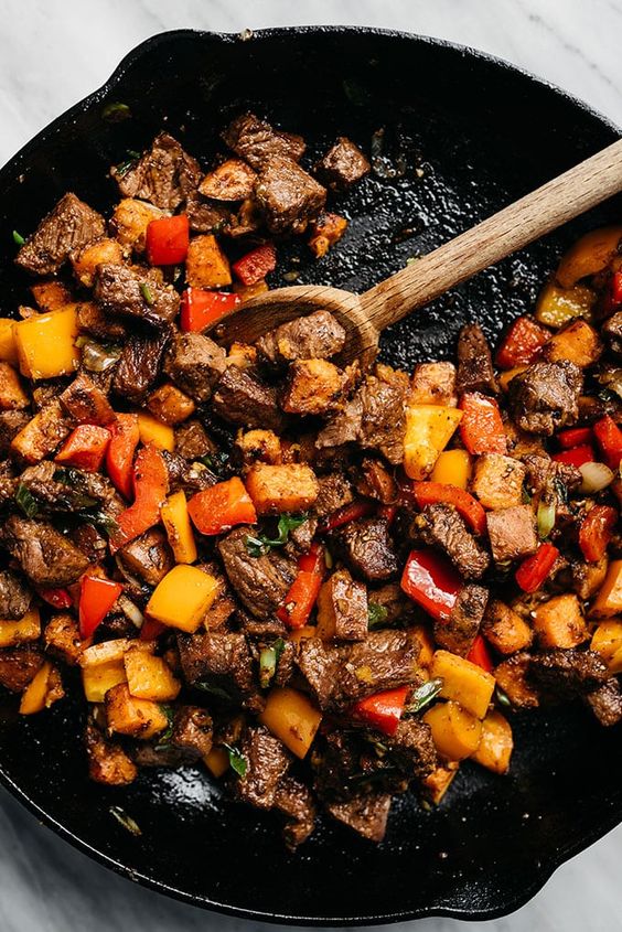 This recipe for Whole30 steak bites is packed with tons of flavor and huge pops of vitamins thanks to colorful sweet potatoes and bell peppers. It's an easy, approachable weeknight dinner recipe that's ready in under 45 minutes. This recipe for Whole30 steak bites is packed with tons of flavor and huge pops of vitamins thanks to colorful sweet potatoes and bell peppers. It's an easy, approachable weeknight dinner recipe that's ready in under 45 minutes.