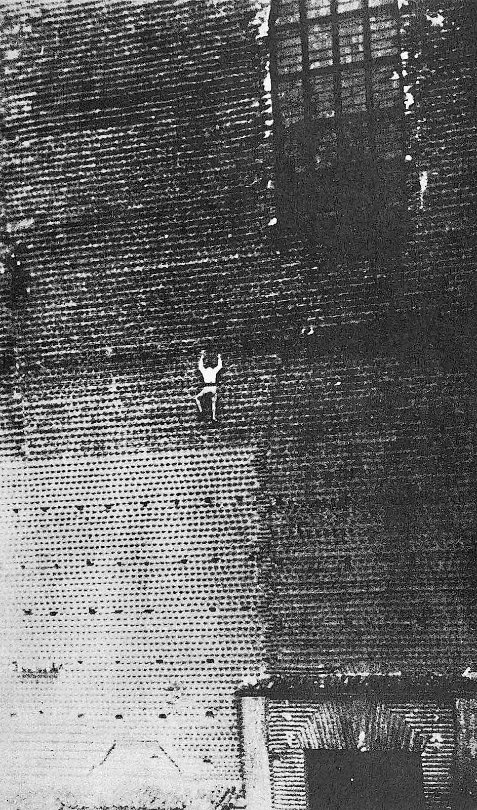1925 human fly a photograph of a 1925 human fly climbing a large building