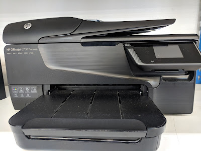 Impresora OfficeJet de inyección de tinta HP.