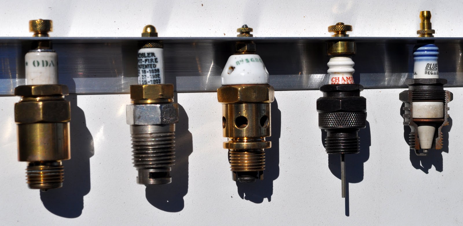 Just A Car Guy Spark plug collection was on display at the annual