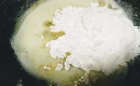 All purpose flour in melted butter for pasta in white sauce recipe