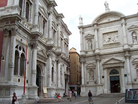 The Scuola Grande di San Rocco (left) adjoins the  Church of San Rocco in Venice in the San Polo district