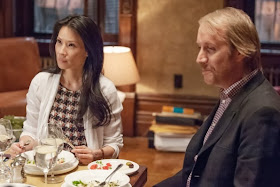 Rhys Ifans as Mycroft Holmes with Lucy Liu as Joan Watson in CBS Elementary Season 2 Episode 7 The Marchioness