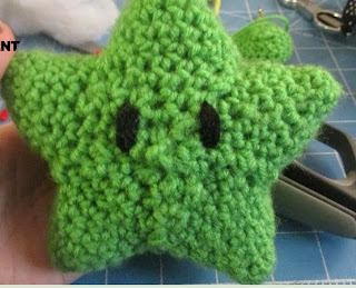 http://translate.google.es/translate?hl=es&sl=en&tl=es&u=http%3A%2F%2Fcrochetqueen.deviantart.com%2Fart%2FGreen-Star-Pattern-507052996