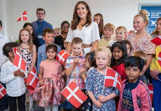 Crown Princess Mary wore a checkered dress from Morten Ussing, Max Mara belt Dulong Delphis large gold earrings, Elhanati Abyss gold necklace