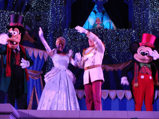 Cinderella and Prince Charming In Front of Castle Dream Lights Magic Kingdom