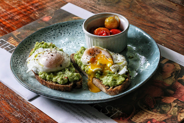 Smashed Avocado on Toast with Poached Egg and Tomatoes