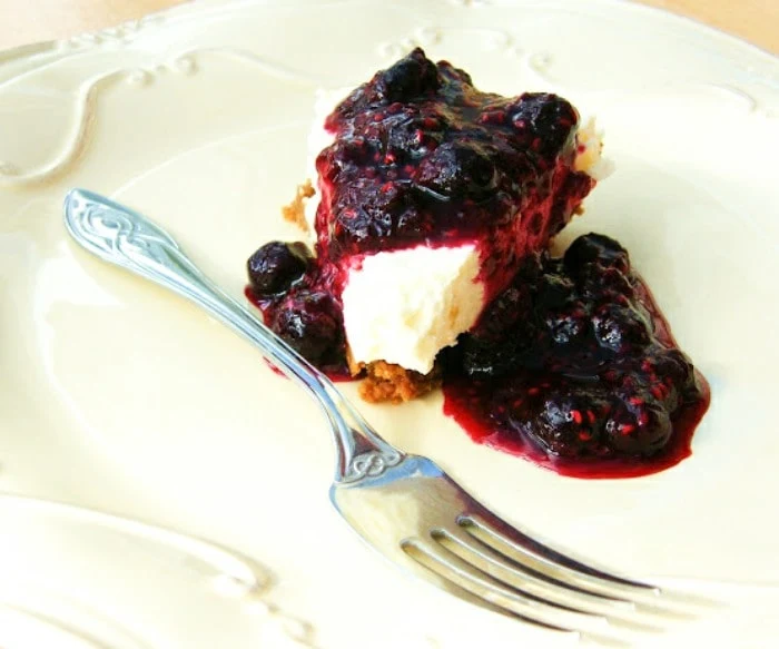 Lemon Cheesecake with a Blueberry & Raspberry Compote