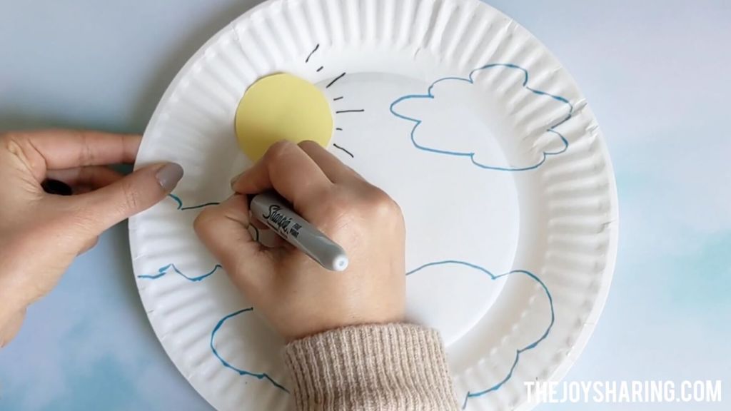 Drawing the sun for rainbow craft