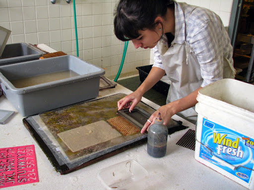 A student makes paper 