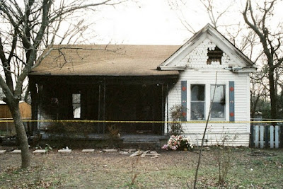 The exterior of the Willingham home after the fire The exterior of the Willingham home after the fire.