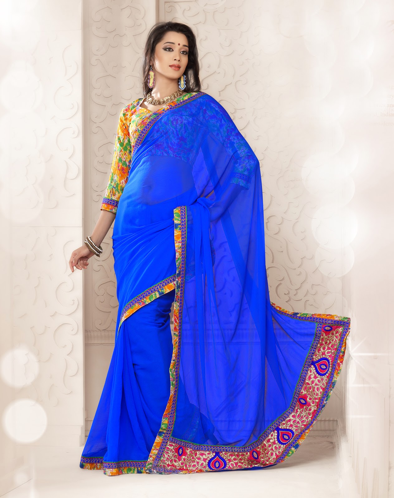 Blue simple party wear saree with multi colored blouse