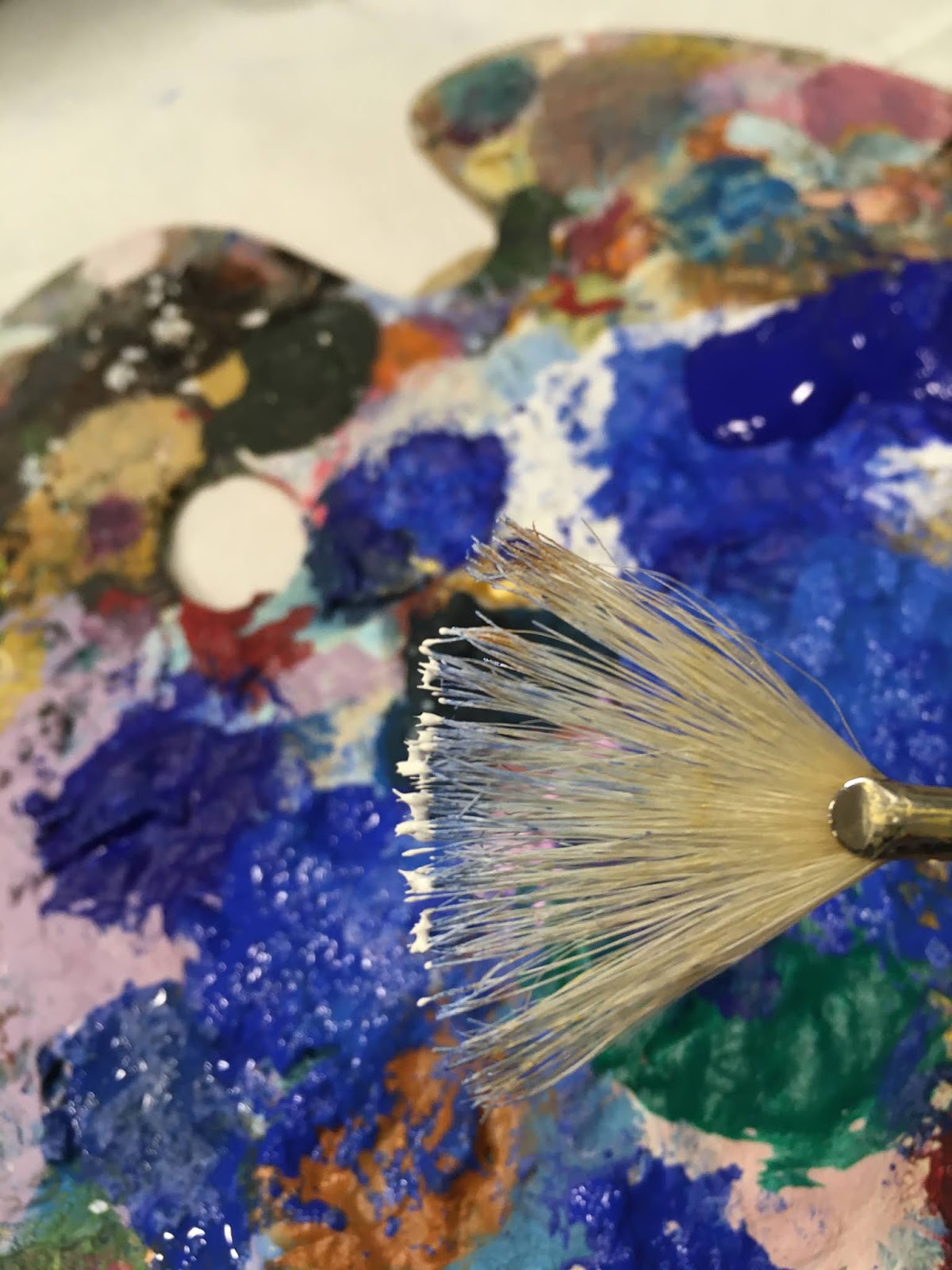 A little paint and a lot of love.. Faux Lapis Lazuli effect on ceramic egg