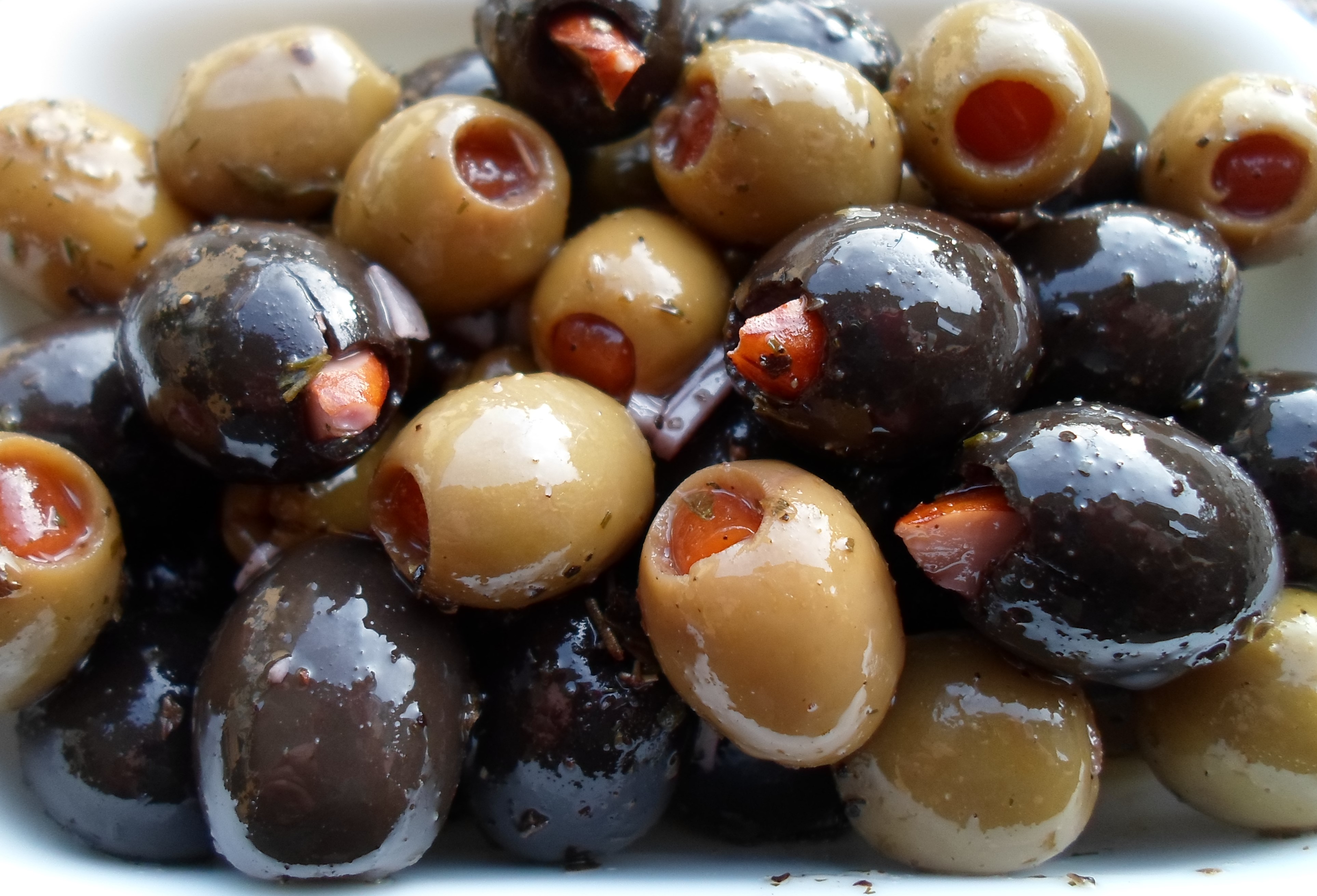 Happier Than A Pig In Mud Marinated Almond Stuffed Olives Appetizer