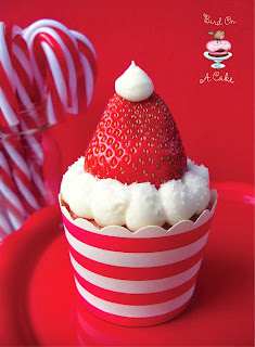 http://birdonacake.blogspot.com/2012/12/strawberry-santa-hat-cupcakes.html