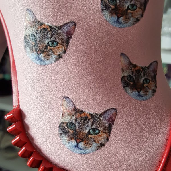 close up of cat print on uppers of ankle boot