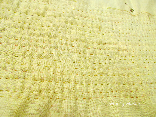 Big stitch hand quilting on linen tablecloth ~ Marty Mason