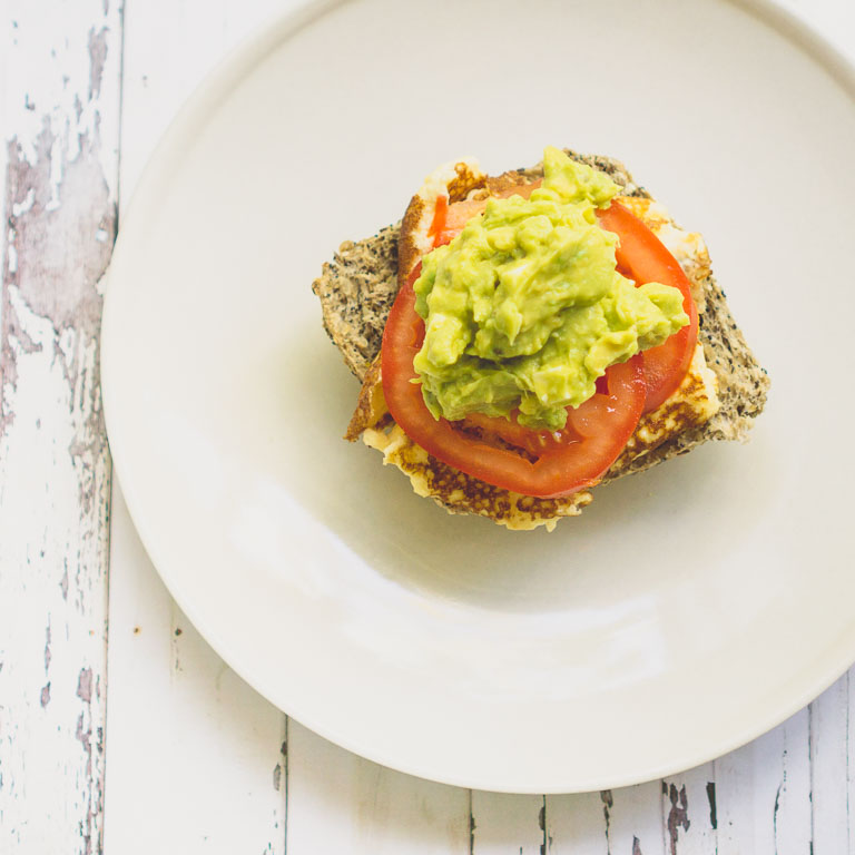 A Low-GI cape seed loaf served with an omelette (cooked in coconut oil), slices of fresh tomatoes and smashed avocado with low fat ricotta. Super simple but very delicious! | in happenstance