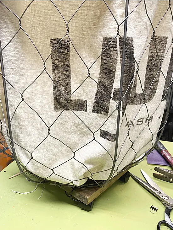 stenciled bag inside basket