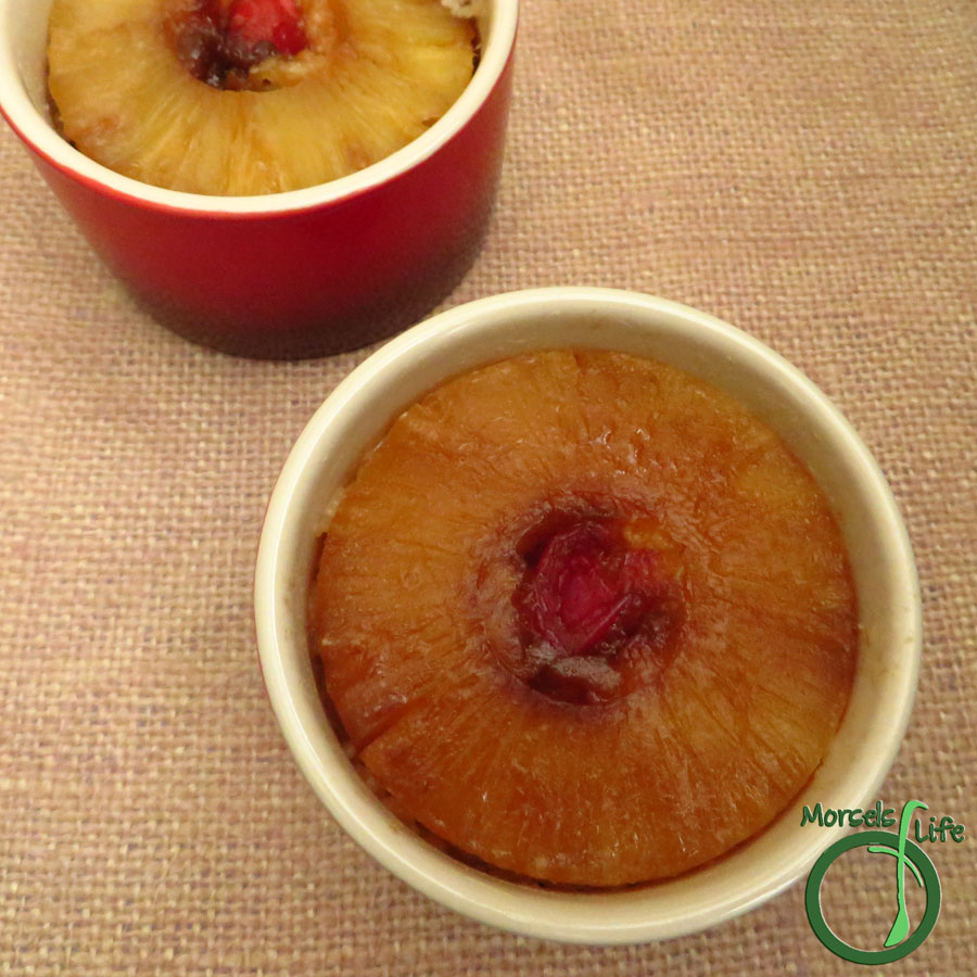 Morsels of Life - Mini Pineapple Upside Down Cake - Mini pineapple upside down cakes consisting of a caramelized pineapple ring and maraschino cherry on top of a soft, sweet cake.